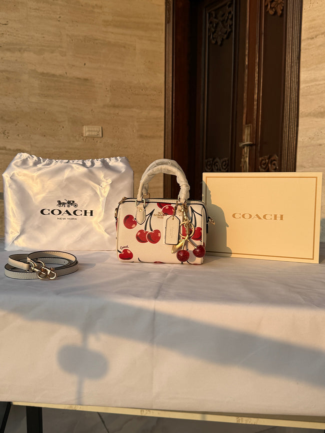 COACH WHITE CHERRY PATTERN BAG WITH CHERRY CHARM Hover Image