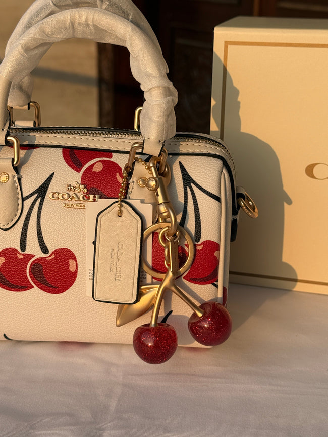 COACH WHITE CHERRY PATTERN BAG WITH CHERRY CHARM Main Image