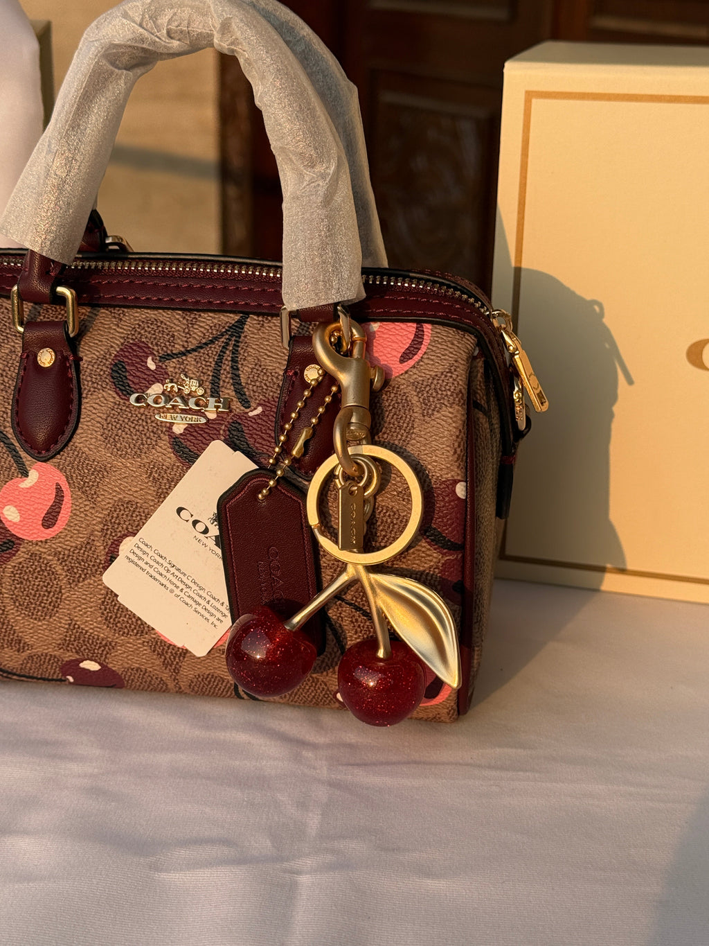 COACH DARK BROWN CHERRY PATTERN BAG WITH CHERRY CHARM