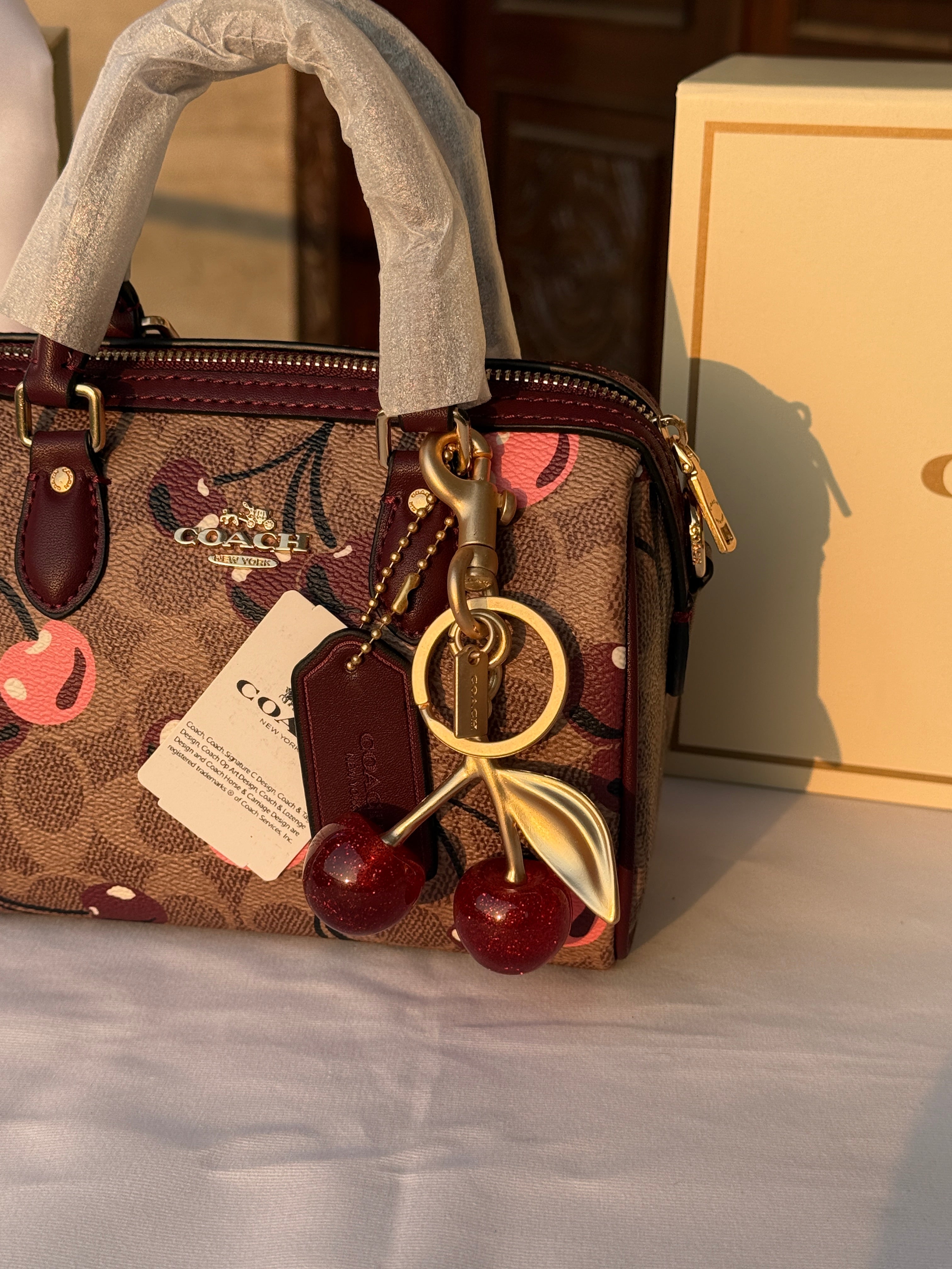 COACH DARK BROWN CHERRY PATTERN BAG WITH CHERRY CHARM