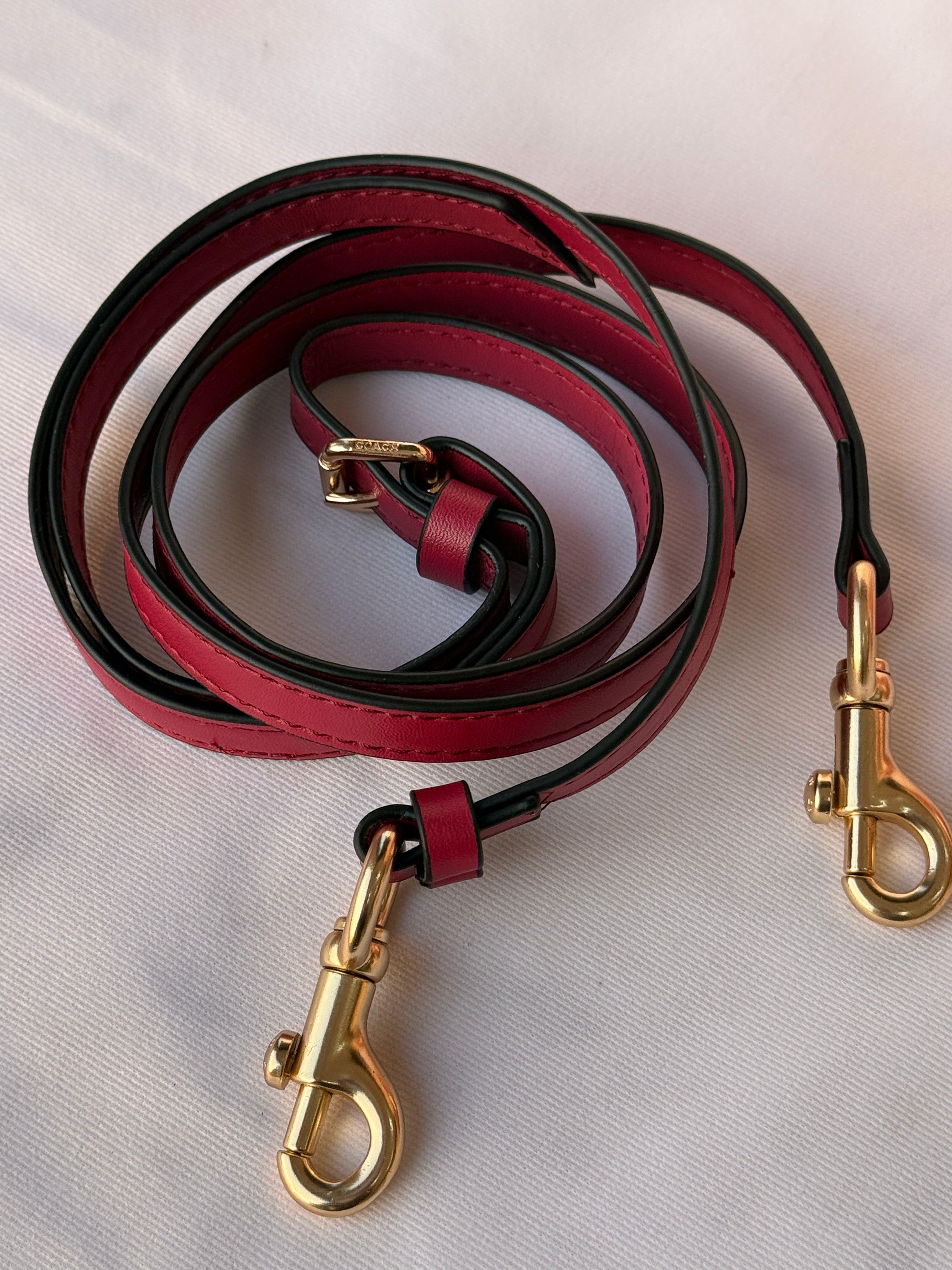 COACH BROWN AND RED PATTERN BAG WITH CHERRY CHARM