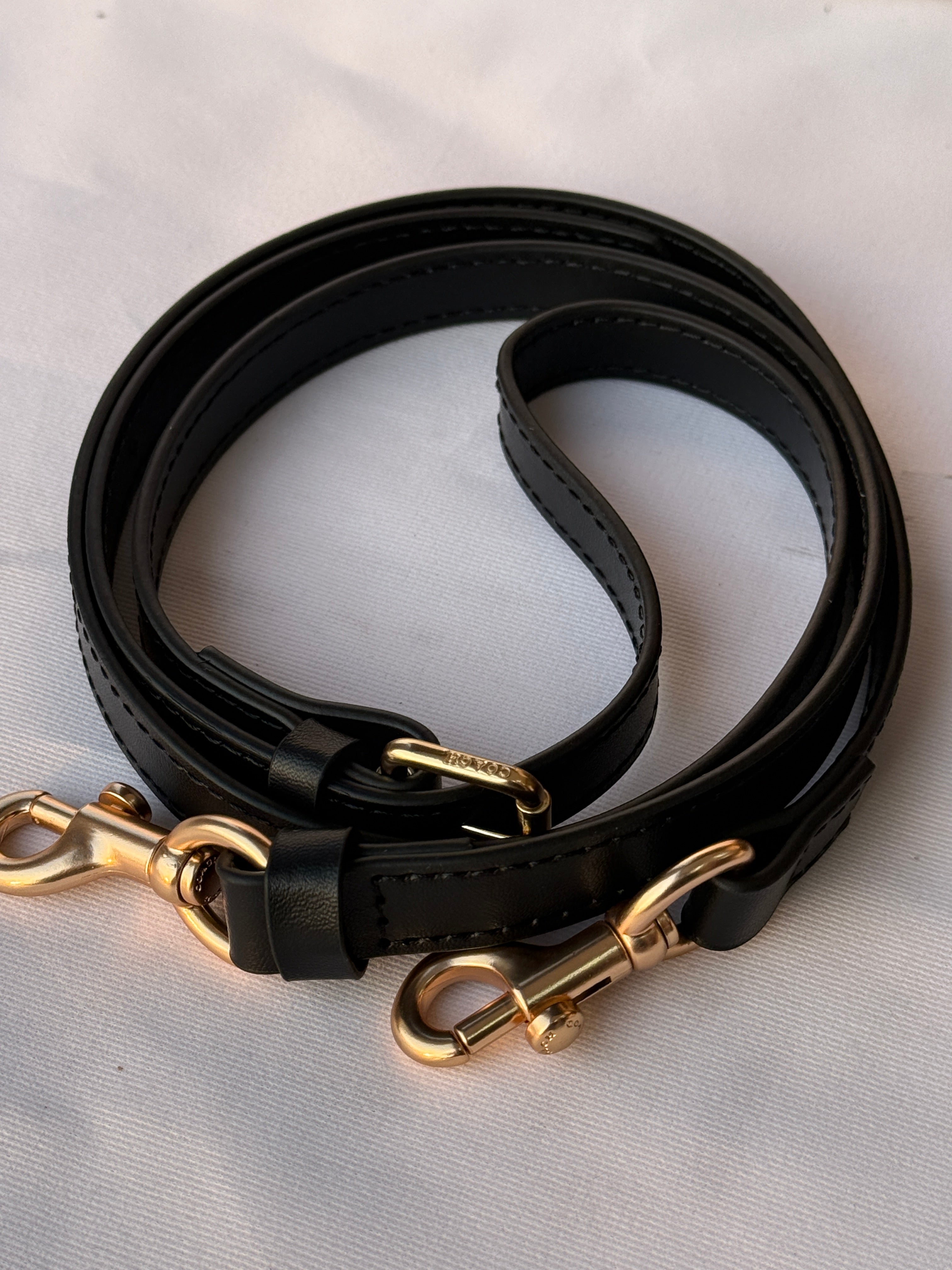 COACH BLACK PATTERN BAG WITH CHERRY CHARM AND 2 STRIPS