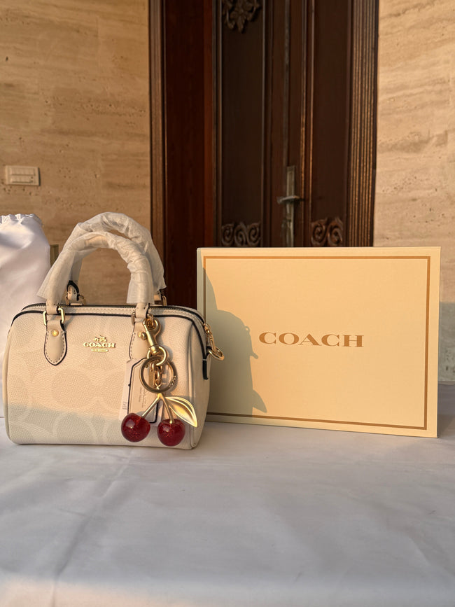 COACH WHITE PATTERN BAG WITH CHERRY CHARM Main Image