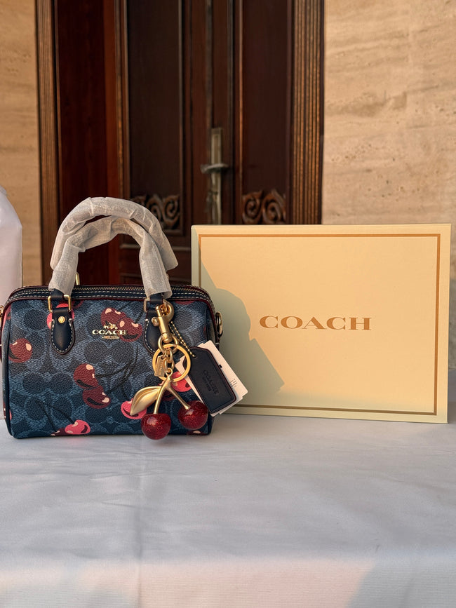 COACH BLUE BAG WITH CHERRY PATTERN AND CHERRY CHARM Main Image