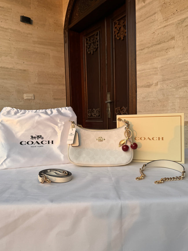 COACH WHITE PATTERN BAG WITH CHERRY CHARM AND 2 STRIPS Hover Image