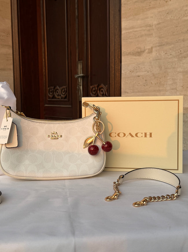 COACH WHITE PATTERN BAG WITH CHERRY CHARM AND 2 STRIPS Main Image