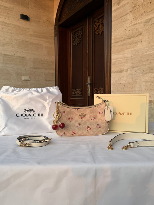 COACH LIGHT BROWN FLOWER PATTERN BAG WITH CHERRY CHARM AND 2 STRIPS Hover Image