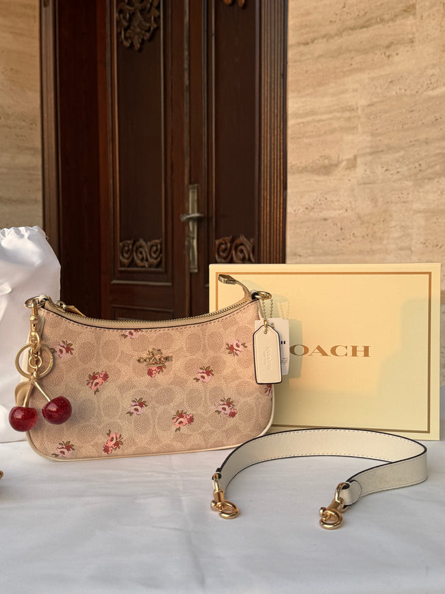 COACH LIGHT BROWN FLOWER PATTERN BAG WITH CHERRY CHARM AND 2 STRIPS Main Image